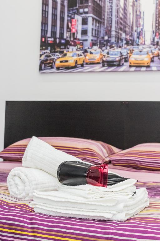Postel nebo postele na pokoji v ubytování Il mondo in una stanza