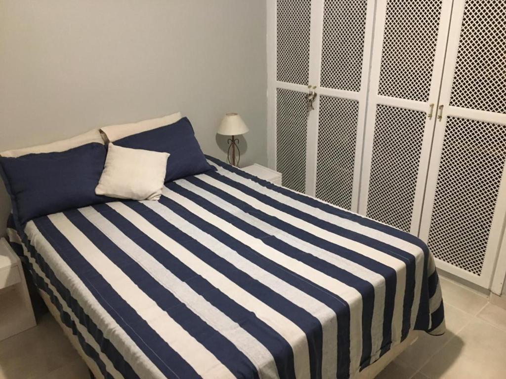 Posteľ alebo postele v izbe v ubytovaní Edificio Casa Blanca