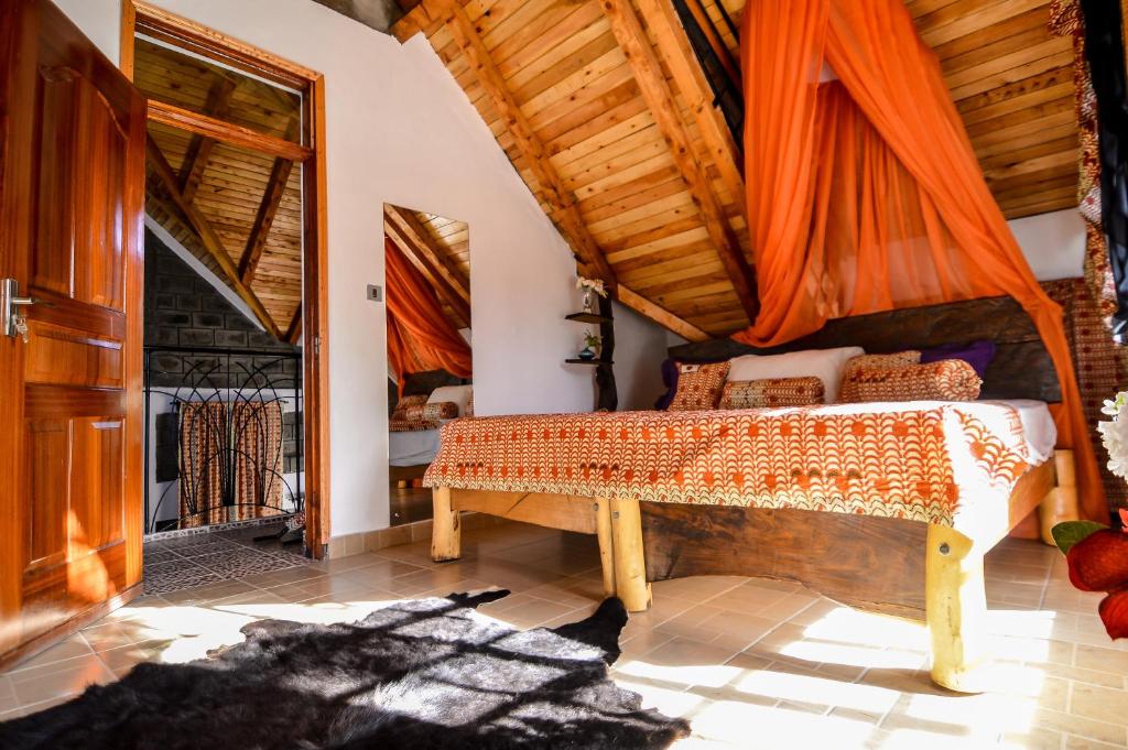 Postel nebo postele na pokoji v ubytování Runda Lofts