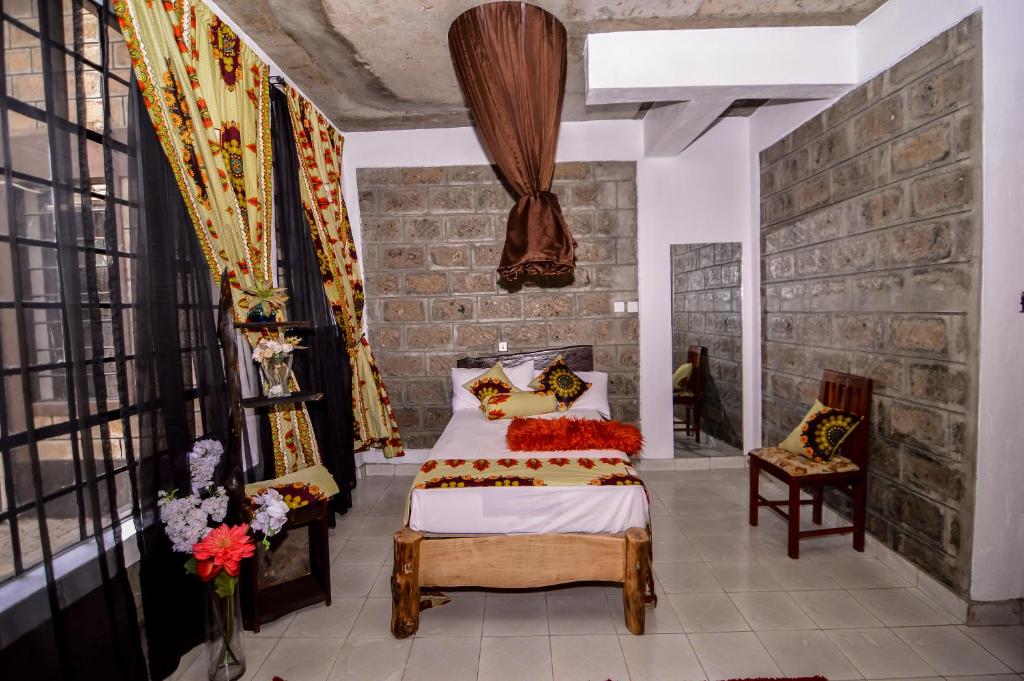 Postel nebo postele na pokoji v ubytování Runda Lofts