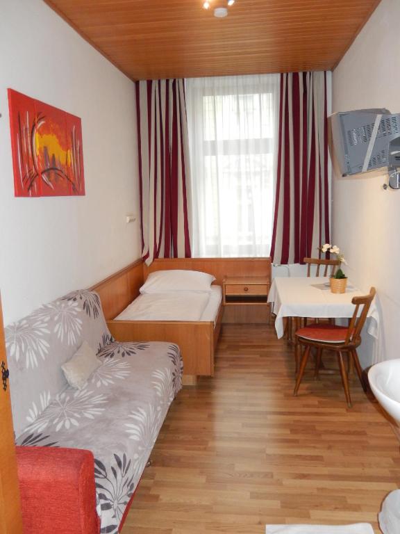 Giường trong phòng chung tại Hotel "Wilder Mann"