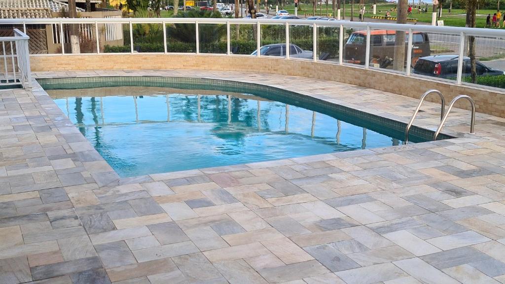  Lindo e Confortável Apartamento pé na areia e com linda vista do mar
