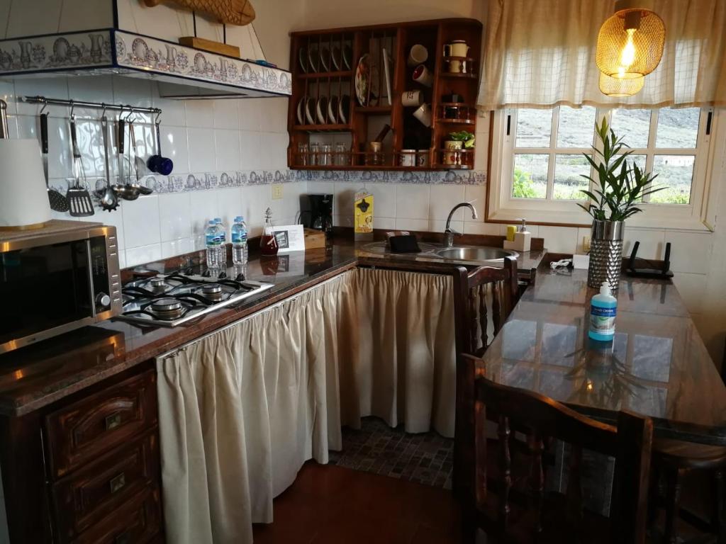 Kuchyň nebo kuchyňský kout v ubytování La Casita de la Breña.