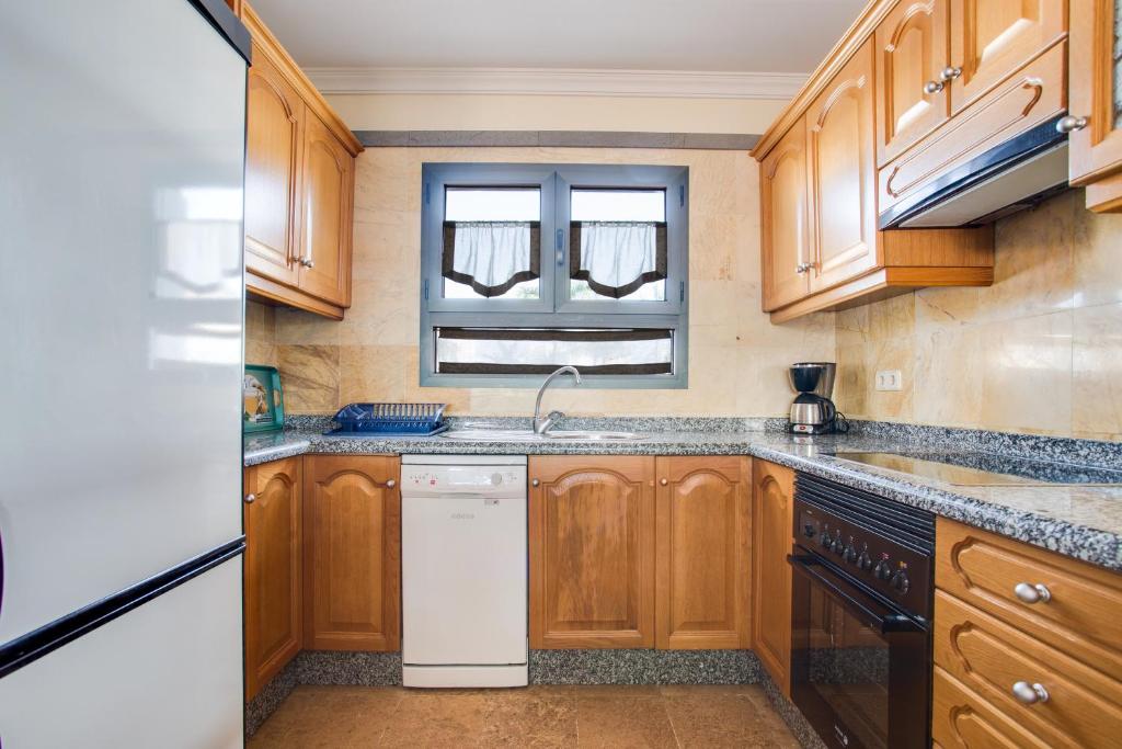 A kitchen or kitchenette at Casa Violeta