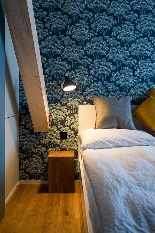 Postel nebo postele na pokoji v ubytování ADLER Boutique Hotel