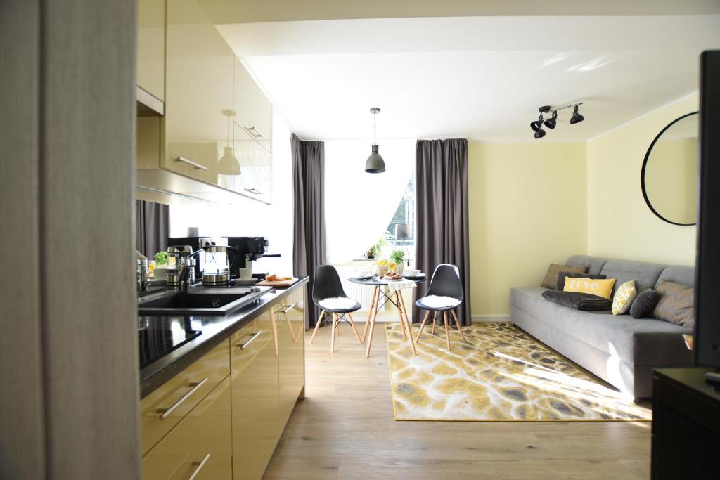 Kuchyňa alebo kuchynka v ubytovaní Apartamenty Pod Gwiazdami