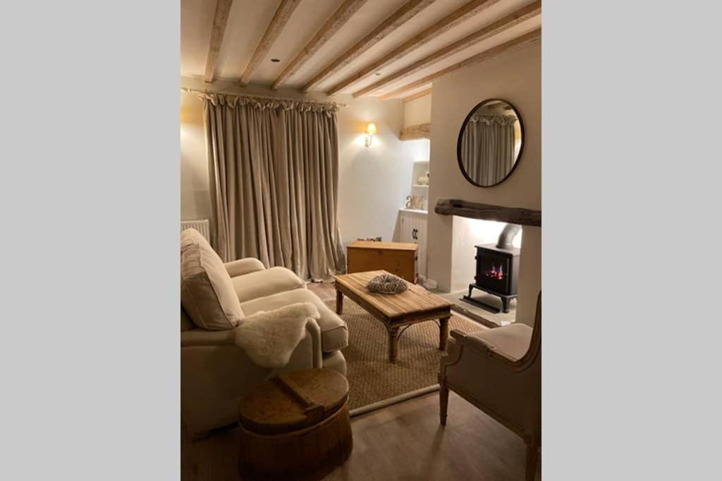 TV a/nebo společenská místnost v ubytování Bailey Cottage