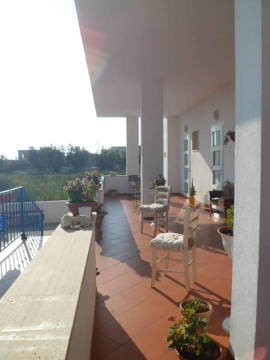 A balcony or terrace at La Caletta Bed and Breakfast