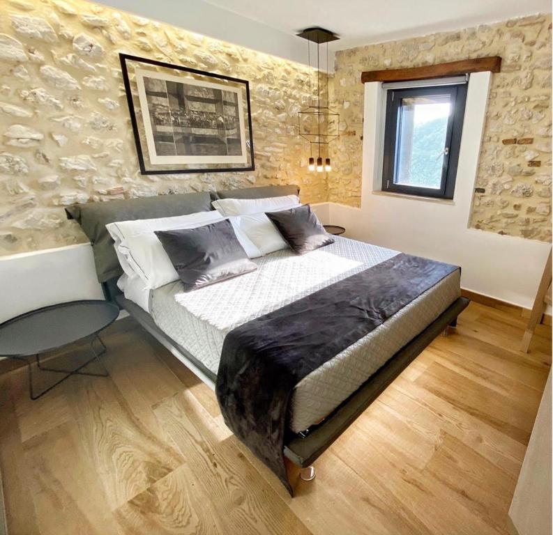 Letto o letti in una camera di Arenarius Home Resort & SPA