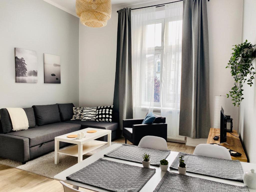 Posedenie v ubytovaní Cozy Apartment in the heart of Jewish District