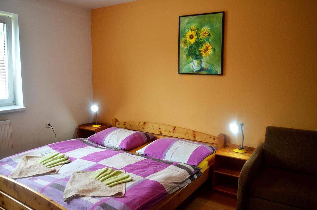 Postel nebo postele na pokoji v ubytování Penzion Jantoľák