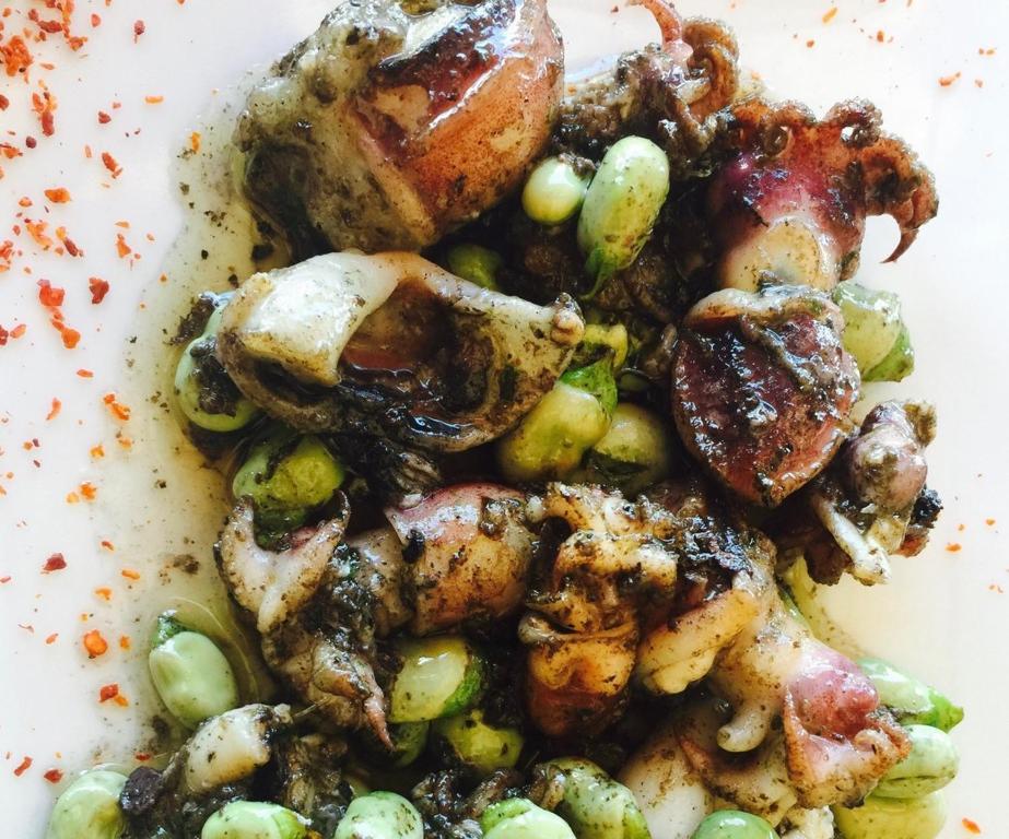 a white plate of food with meat and vegetables at Hotel Playa Canet in Canet de Berenguer