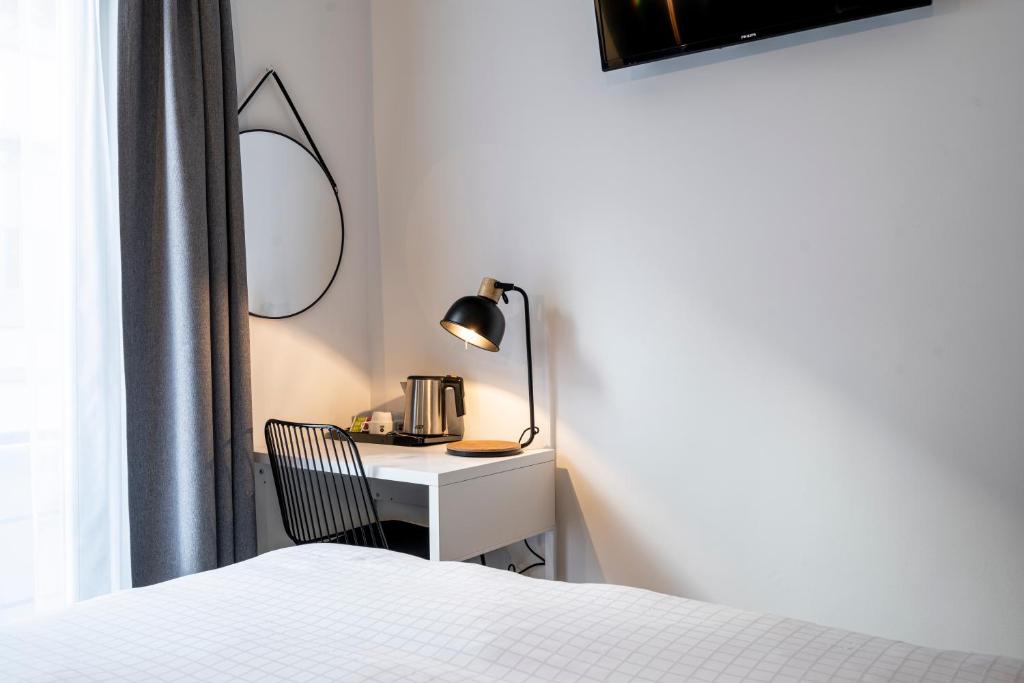 Postel nebo postele na pokoji v ubytování Beverly Hills Hotel