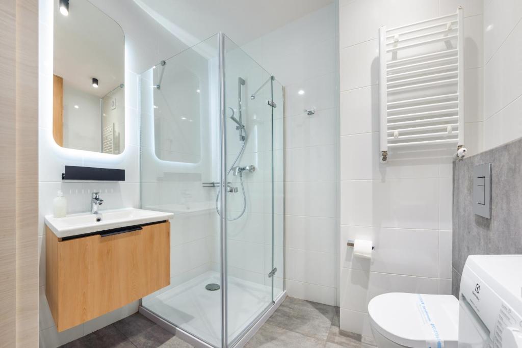 Kúpeľňa v ubytovaní Apartamenty Sun & Snow Residence II Jastrzębia Góra - plac zabaw, blisko plaży, wysoki standard