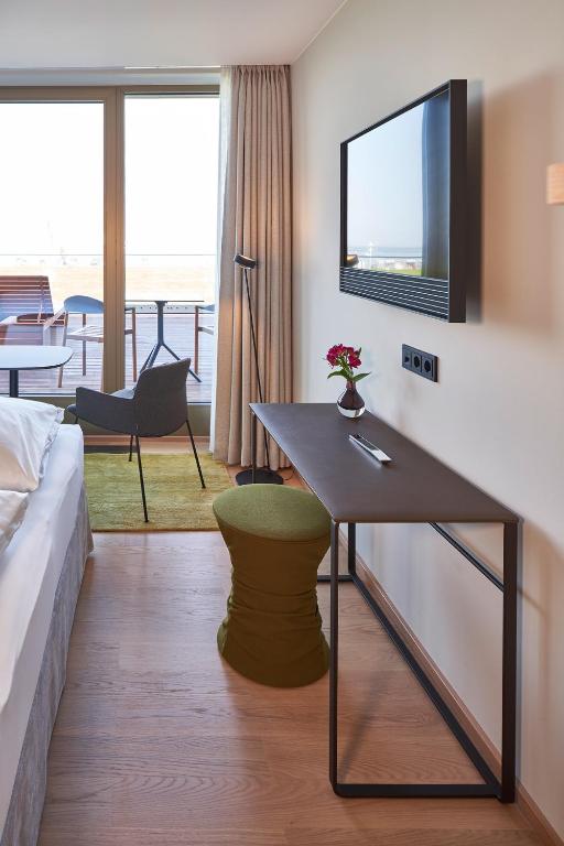 TV a/nebo společenská místnost v ubytování Hotel Misan