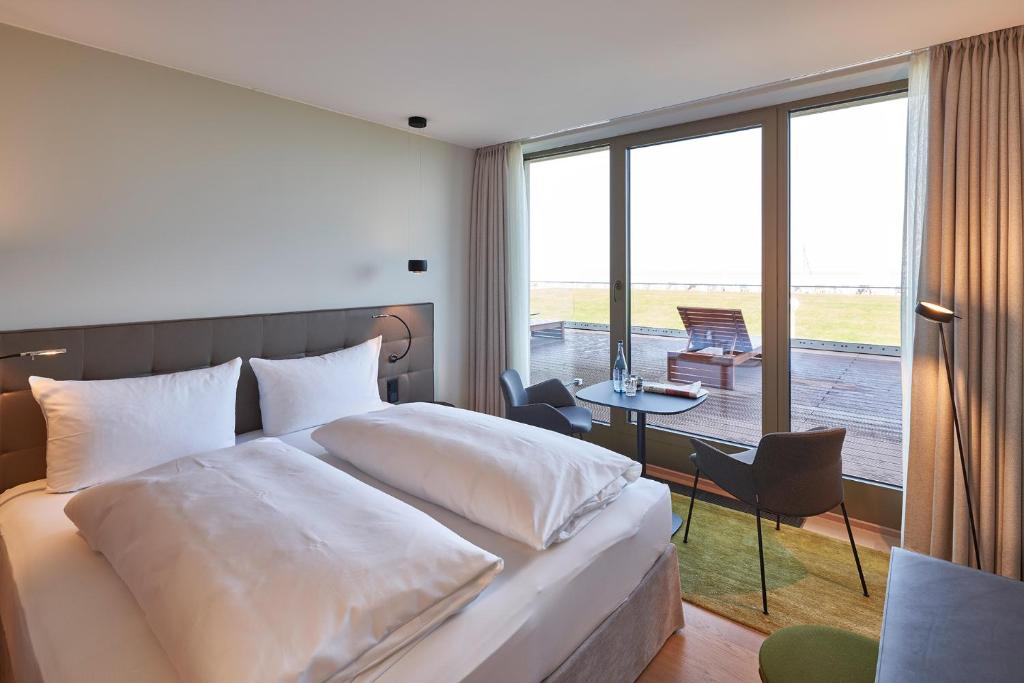 Postel nebo postele na pokoji v ubytování Hotel Misan