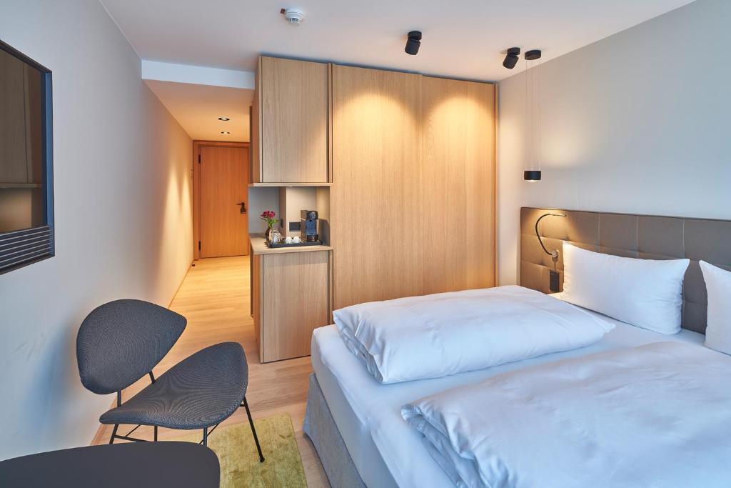 Postel nebo postele na pokoji v ubytování Hotel Misan