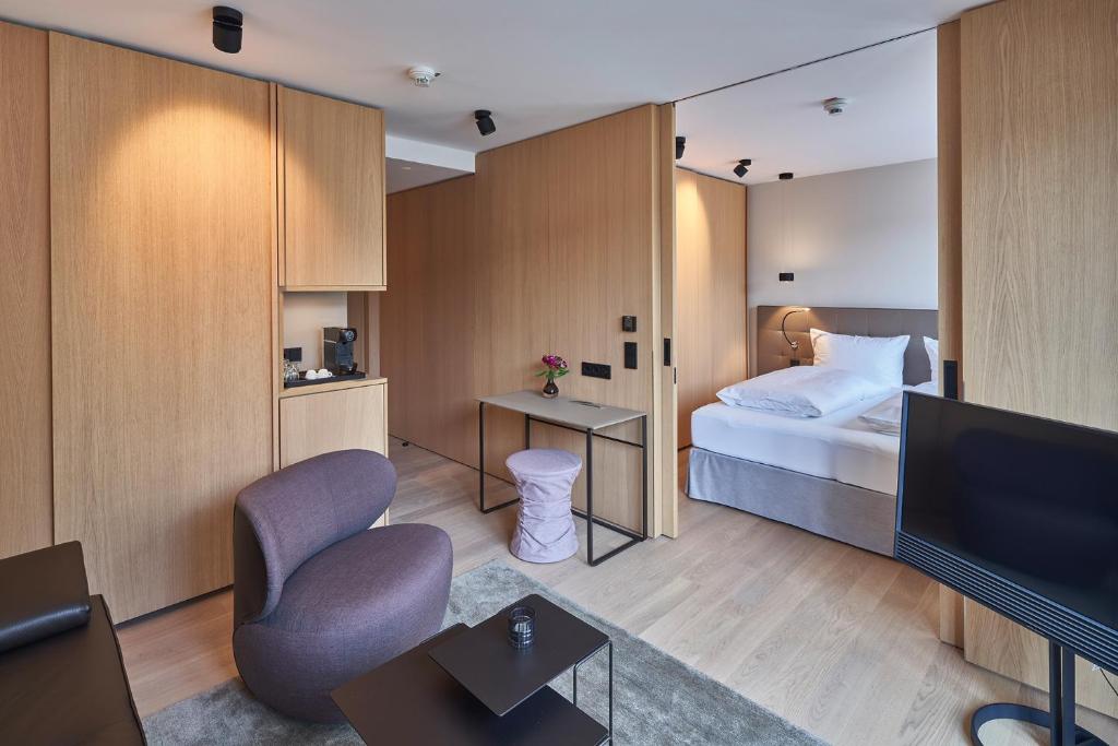 Postel nebo postele na pokoji v ubytování Hotel Misan