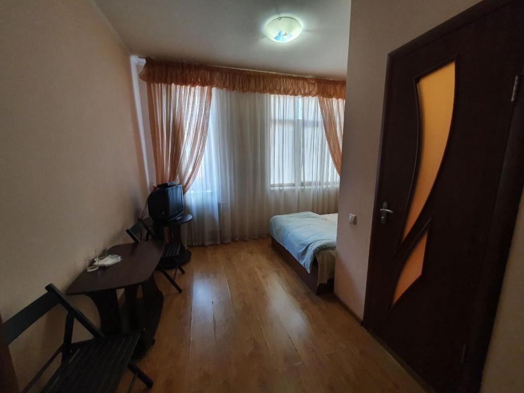 Postel nebo postele na pokoji v ubytování Мотель Карман