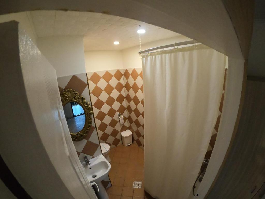 Koupelna v ubytování Hotel Mon Caprice