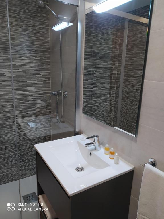 Koupelna v ubytování Apartamentos Alameda
