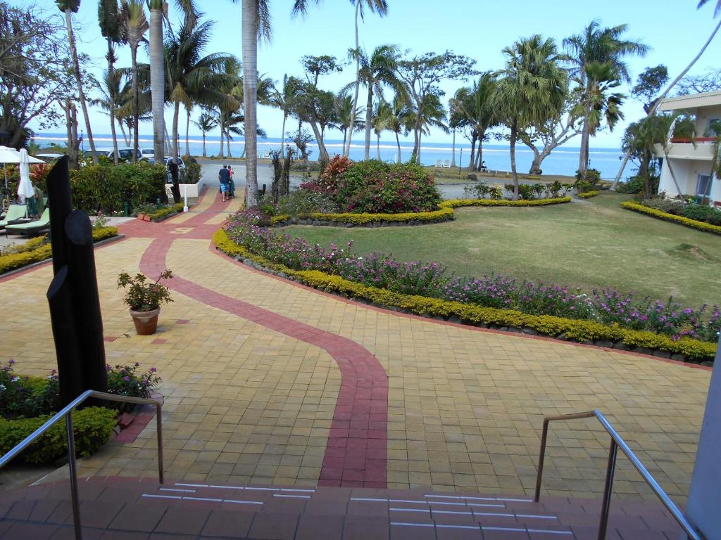 Jardí fora de Bedarra Beach Inn