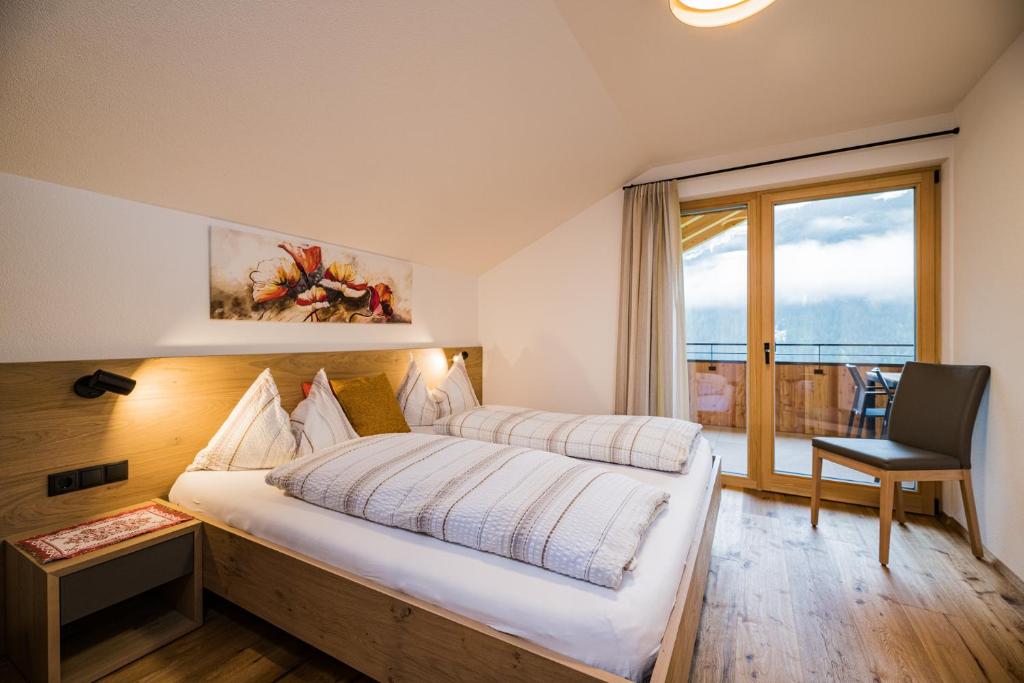 Postel nebo postele na pokoji v ubytování Appartement Förra