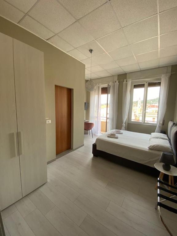 Postel nebo postele na pokoji v ubytování B&b note di mare