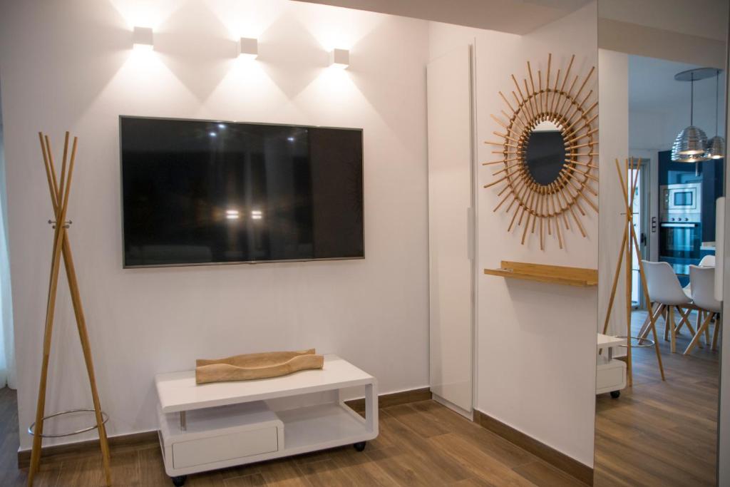 TV a/nebo společenská místnost v ubytování LE TERRAZZE 4