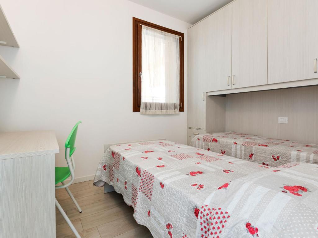 Łóżko lub łóżka w pokoju w obiekcie Holiday Home in Lazise near Lake Garda