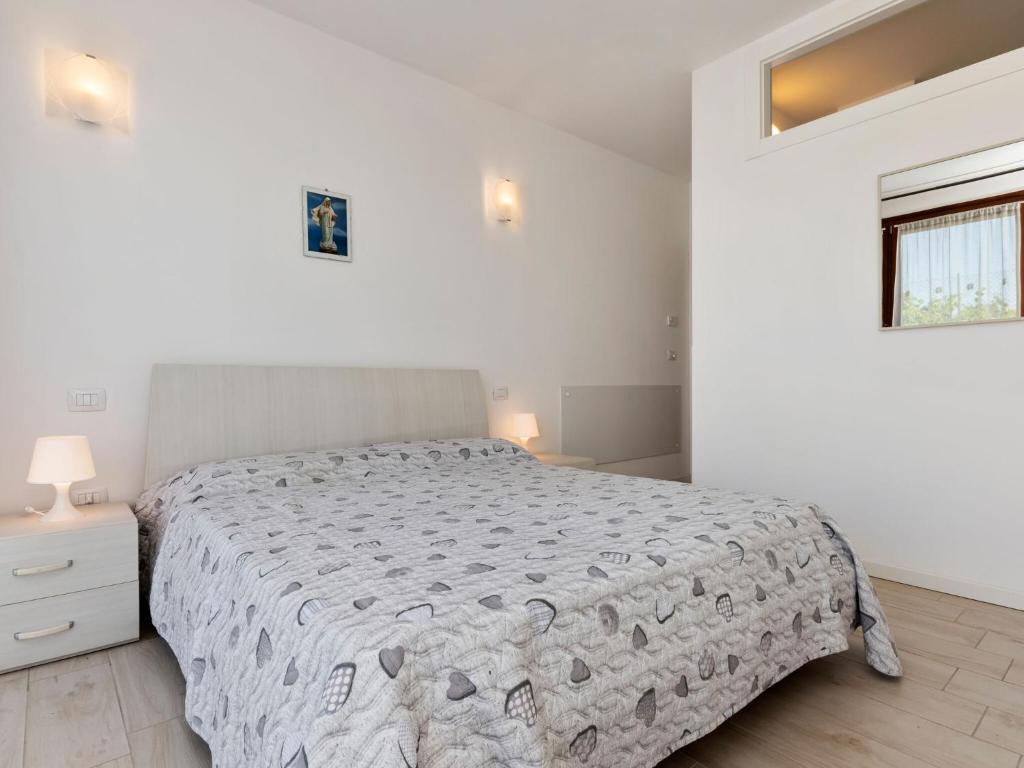 Łóżko lub łóżka w pokoju w obiekcie Holiday Home in Lazise near Lake Garda