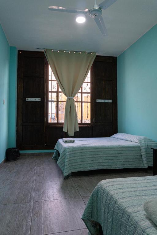 Postel nebo postele na pokoji v ubytování Desert Nights Hostel