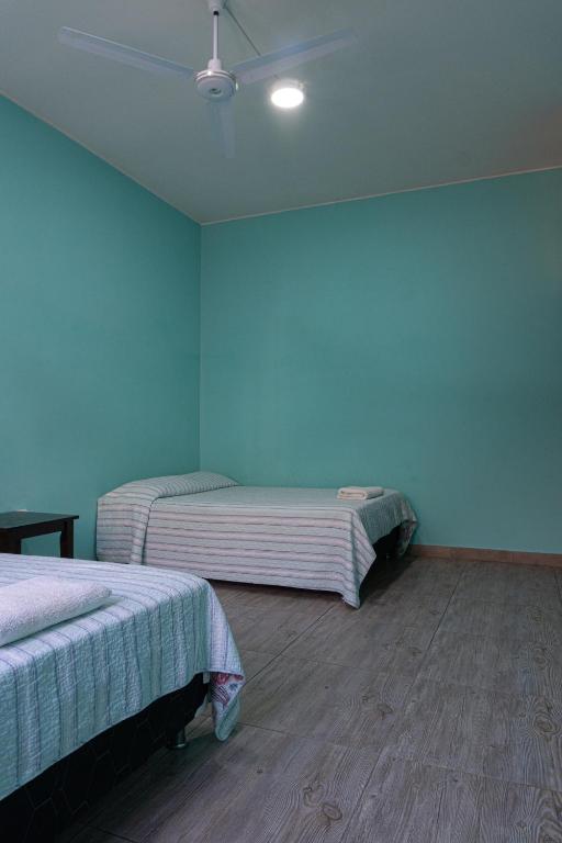 Postel nebo postele na pokoji v ubytování Desert Nights Hostel