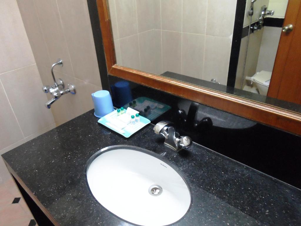 Koupelna v ubytování Hotel PLR Grand