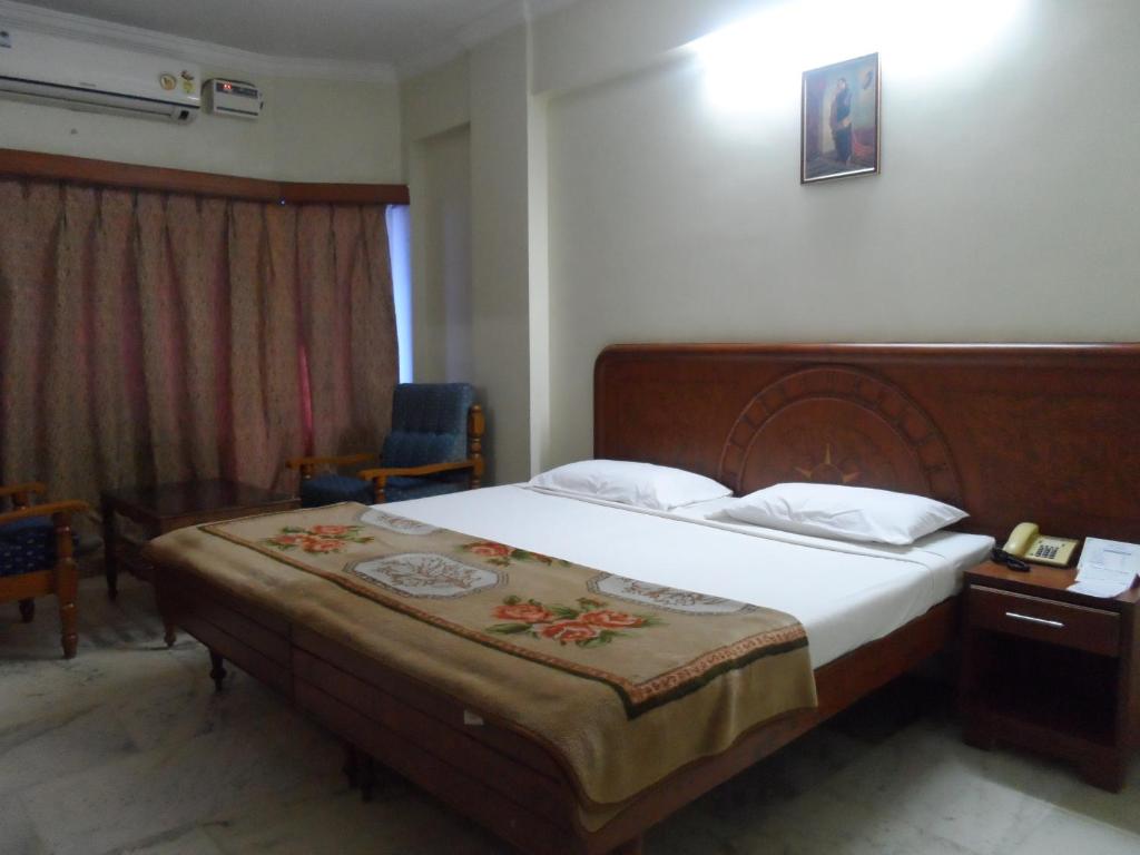 Postel nebo postele na pokoji v ubytování Hotel PLR Grand