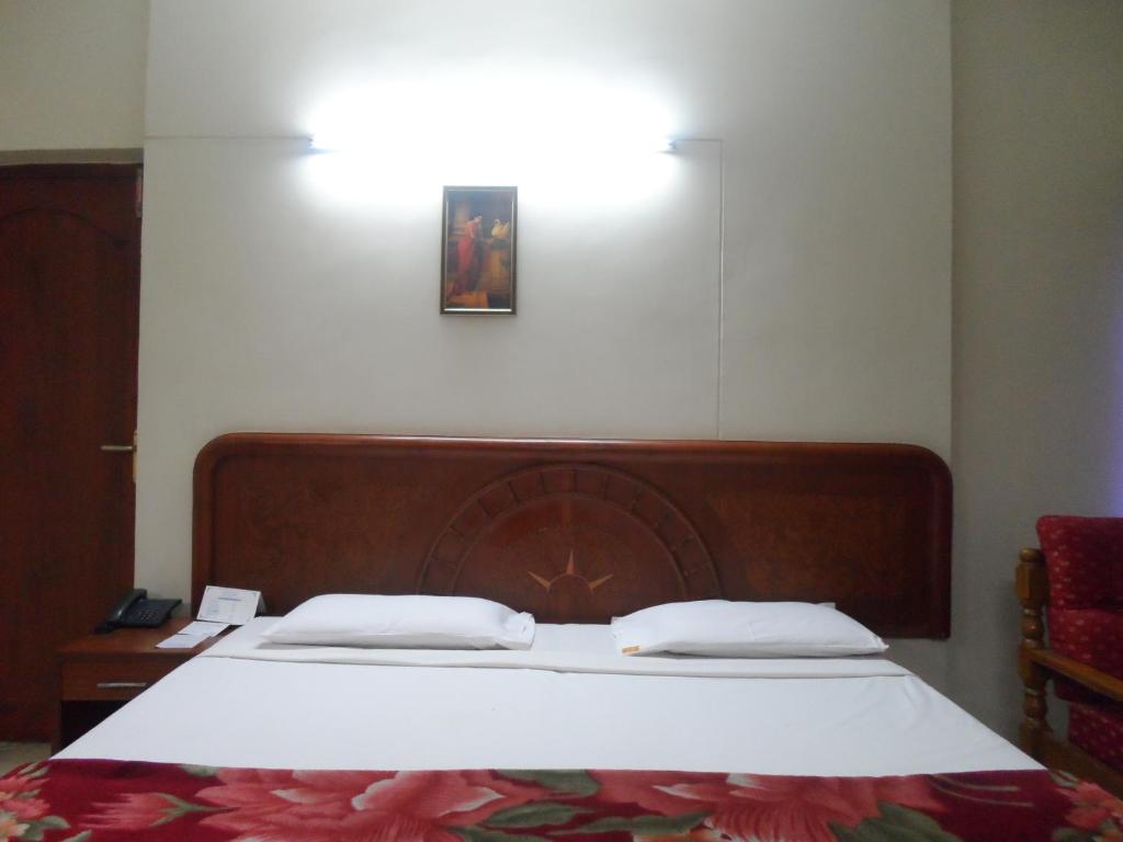 Postel nebo postele na pokoji v ubytování Hotel PLR Grand