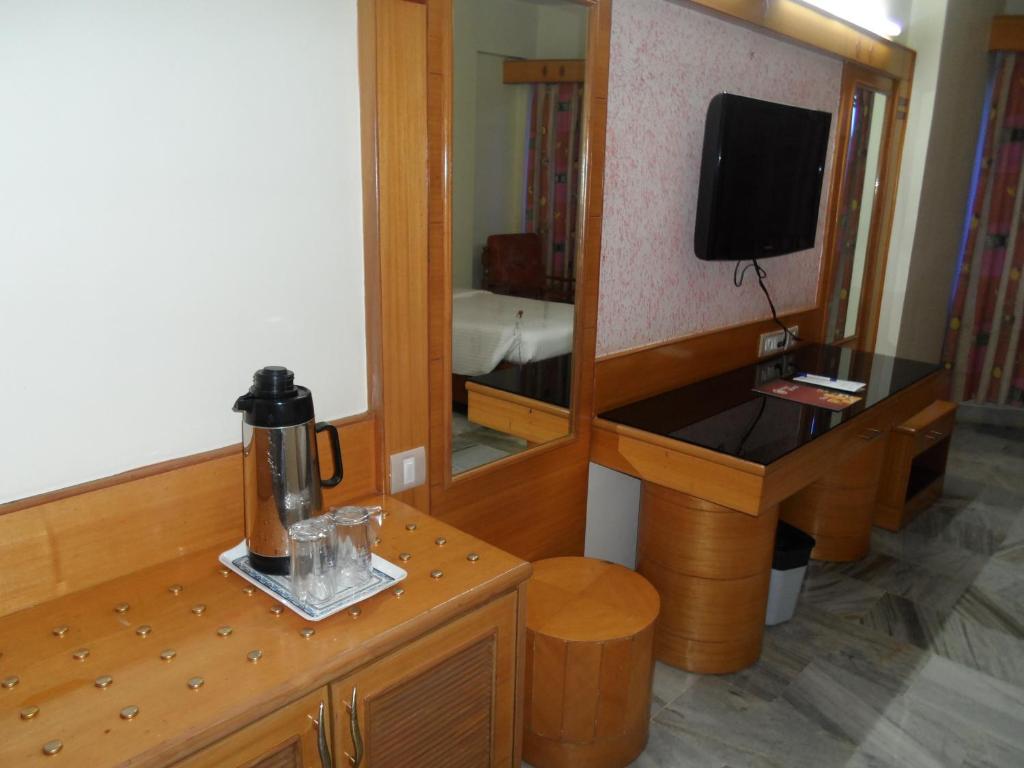 TV a/nebo společenská místnost v ubytování Hotel PLR Grand