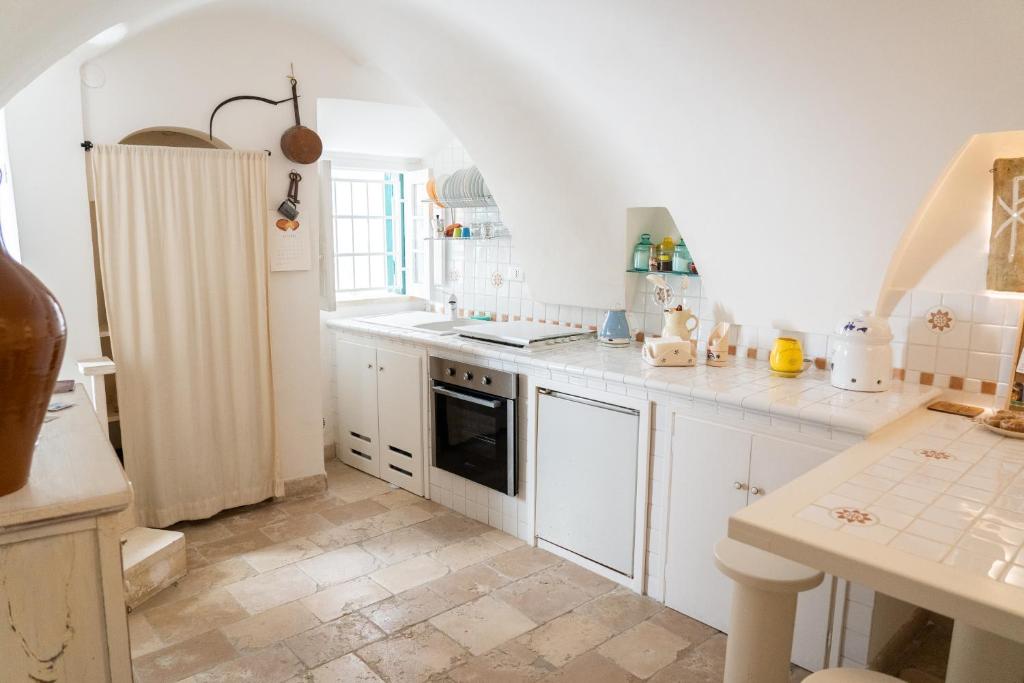 Kuchyňa alebo kuchynka v ubytovaní Casa La Calce