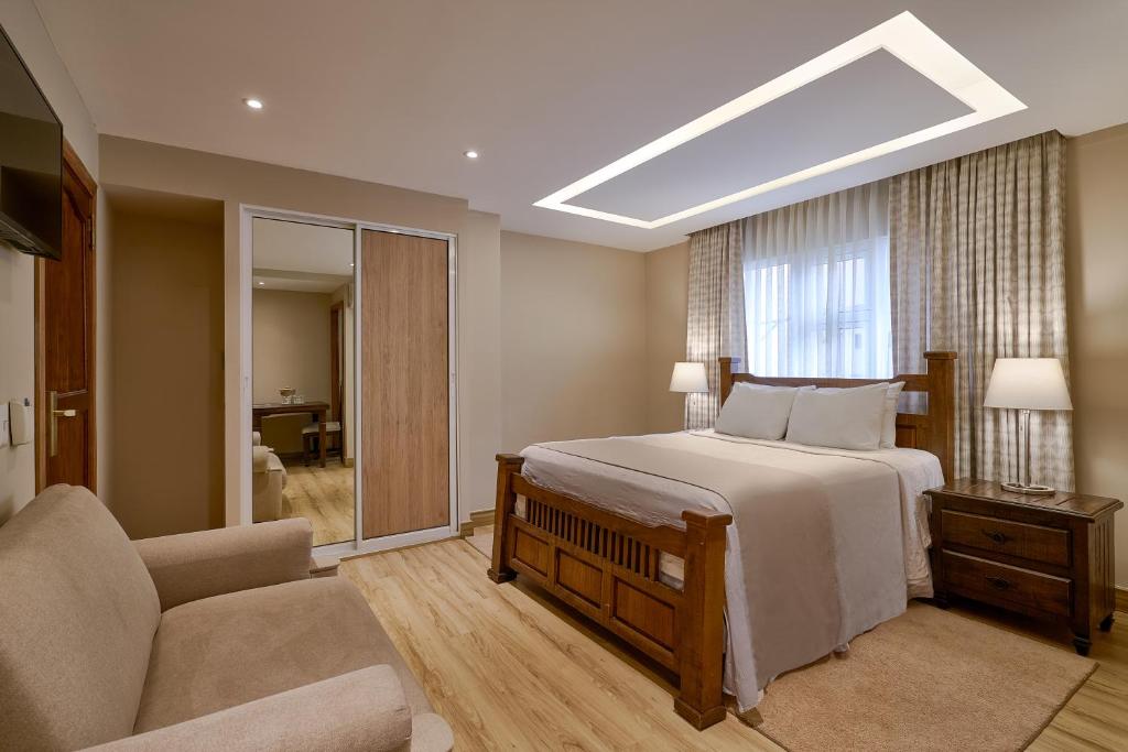 Postel nebo postele na pokoji v ubytování Hotel Riazor