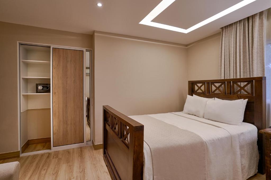 Postel nebo postele na pokoji v ubytování Hotel Riazor