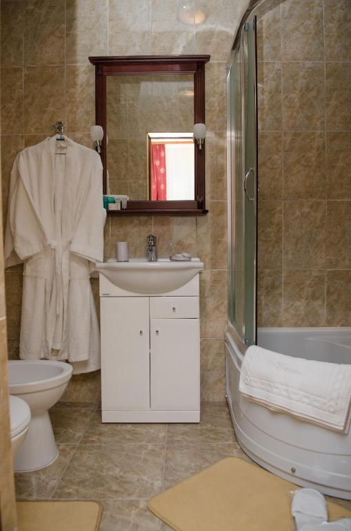 Koupelna v ubytování Naftusya Hotel