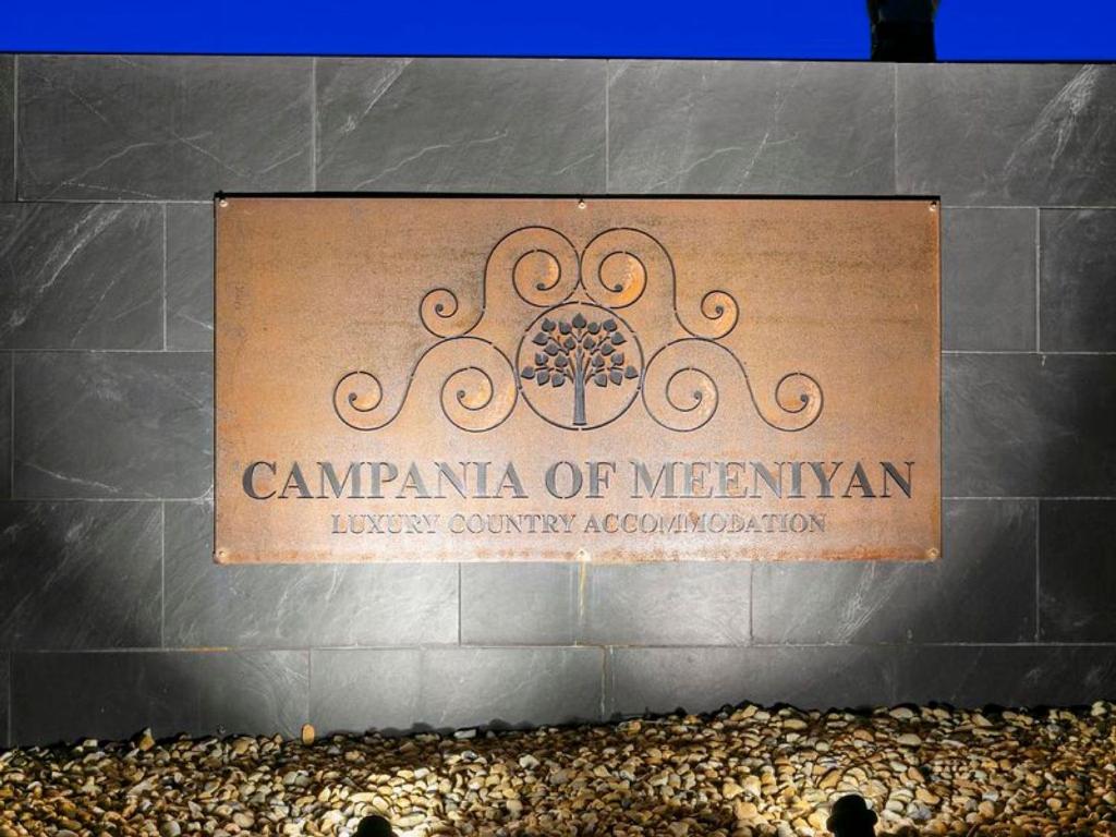 a sign for the cambria of mexicanlaw country association at Campania Non Spa Suite in Meeniyan