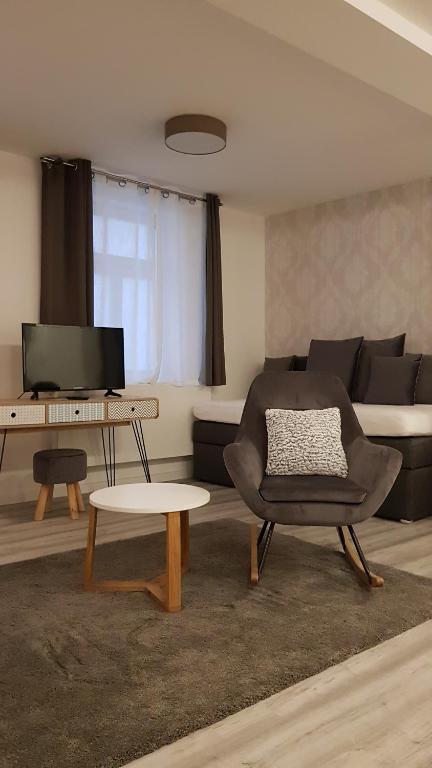 Posezení v ubytování Hotel-Pension Adler Untertürkheim