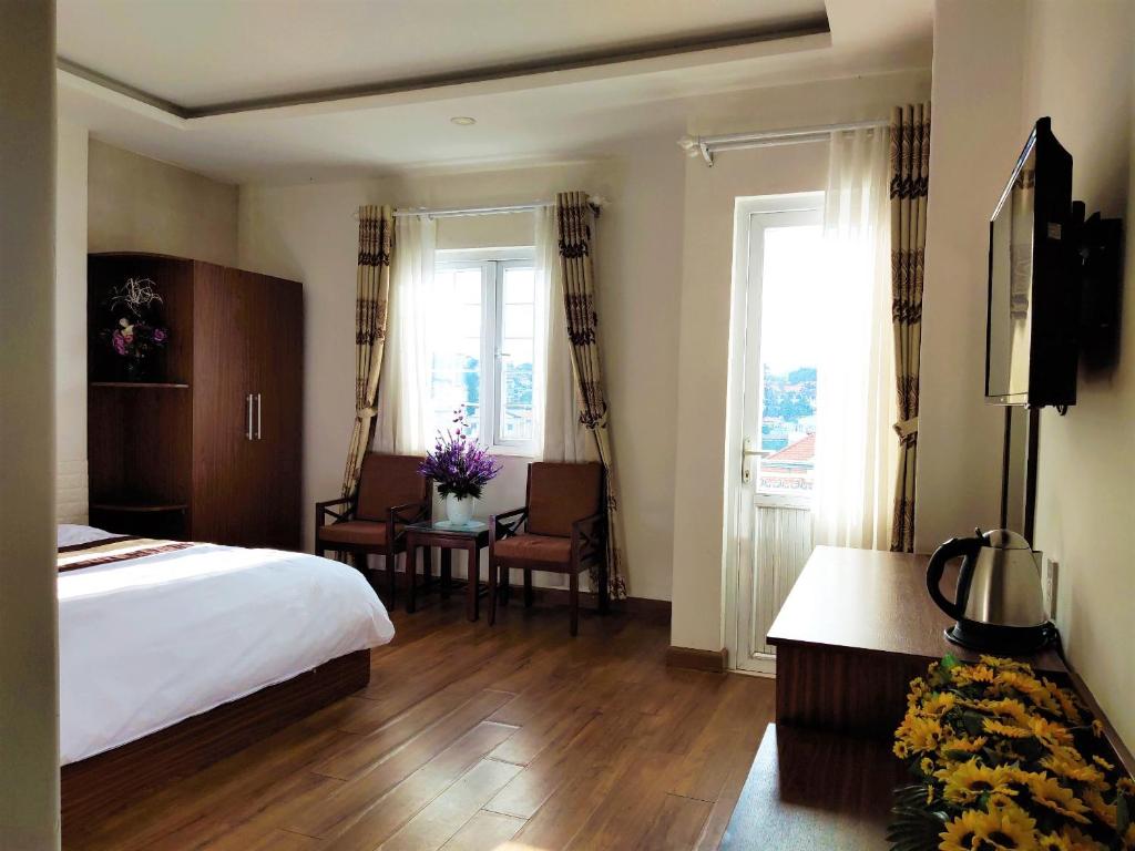 TV/trung tâm giải trí tại New Hampton Suits-Tam Xuan Centre Hotel