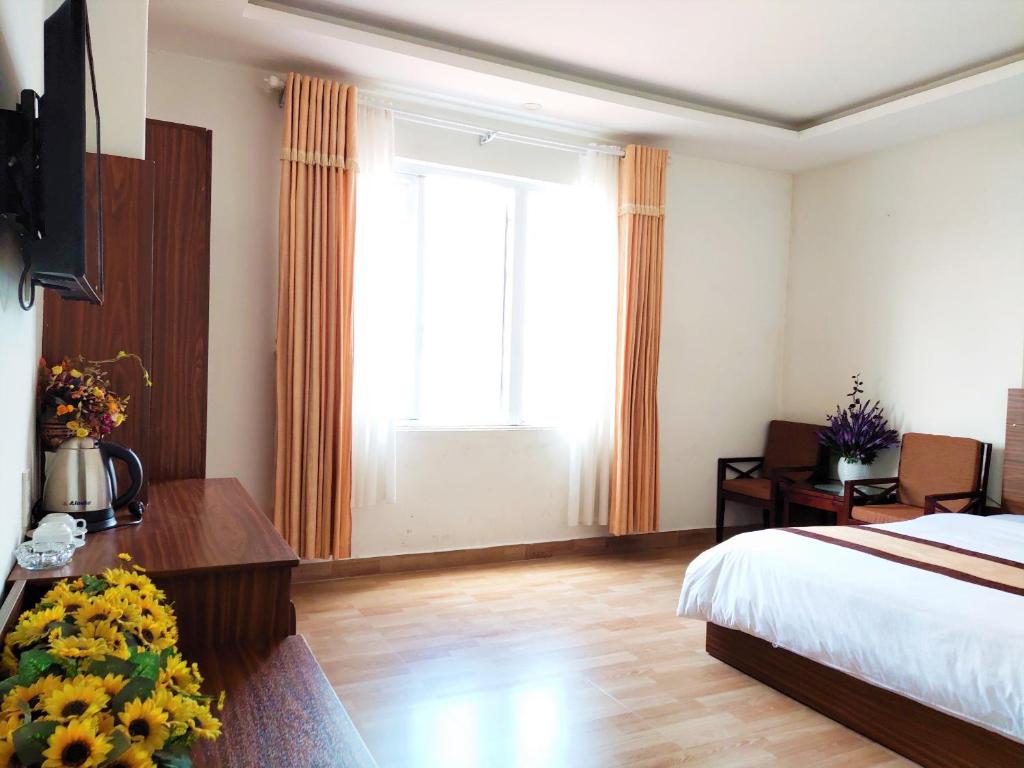 TV/trung tâm giải trí tại New Hampton Suits-Tam Xuan Centre Hotel