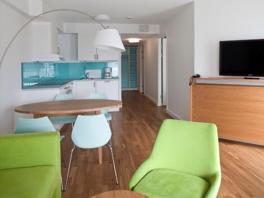 TV a/nebo společenská místnost v ubytování Thon Hotel Sandven