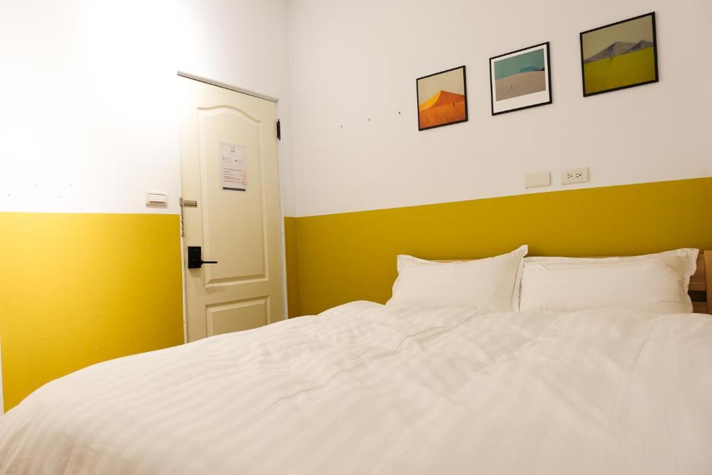 Postel nebo postele na pokoji v ubytování Small Island Homestay