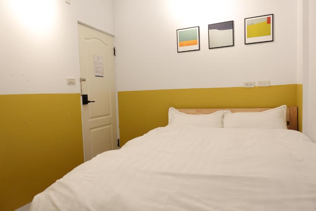 Postel nebo postele na pokoji v ubytování Small Island Homestay