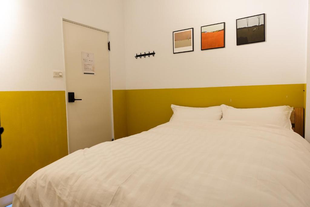 Postel nebo postele na pokoji v ubytování Small Island Homestay