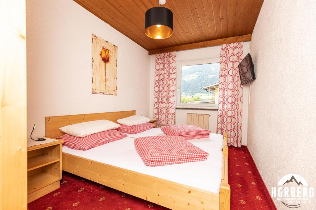 Posteľ alebo postele v izbe v ubytovaní HORBERG Appartements